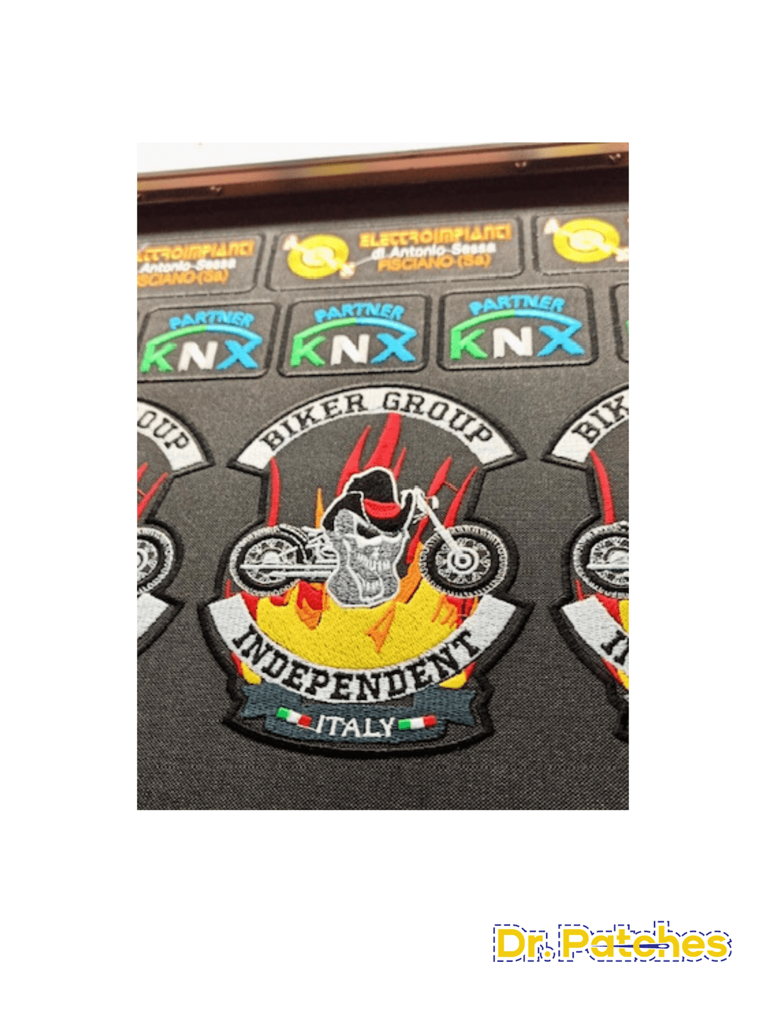 custom emroidered patch for a italian biker club showing a motorcycle with a cap, flames in the background